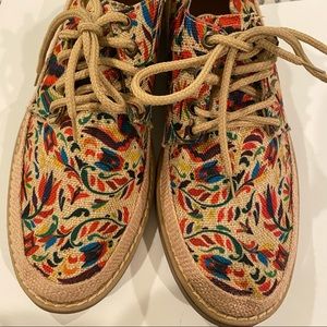 Handcrafted floral flats.